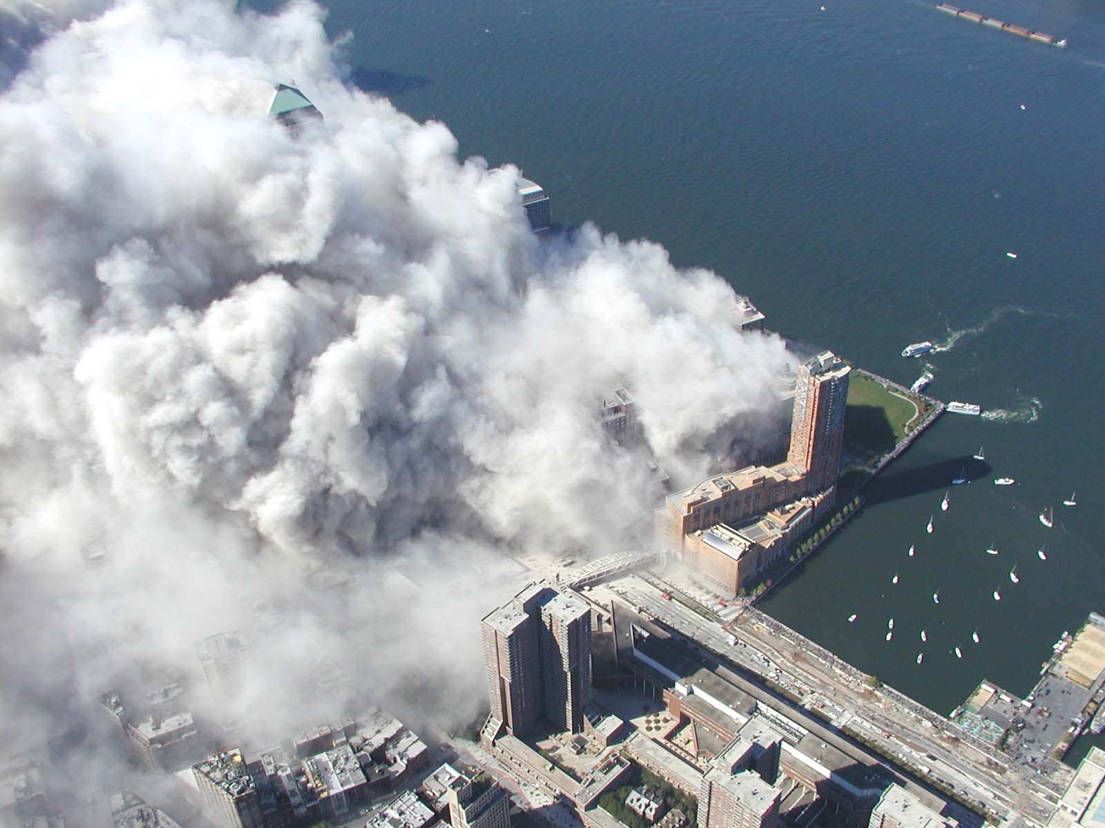 Dust cloud showing secondary vertical rise after horizontal momentum ceased, demonstrating anomalous vertical volumetric expansion